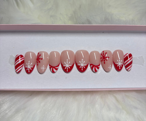 peppermint swirl christmas holiday snowflakes red white press-on nails by Polished by Maddie