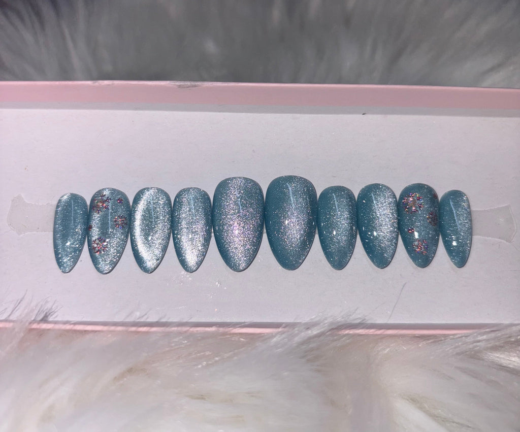 blue icy winter cat eye silver snowflakes christmas holidays press-on nails by Polished by Maddie