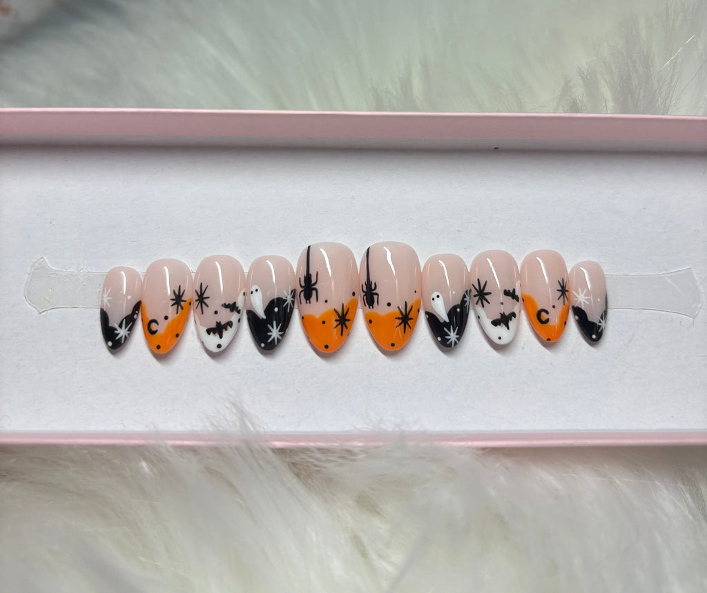 orange white black stars moons ghosts halloween spooky press-on nails by Polished by Maddie