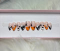 orange white black stars moons ghosts halloween spooky press-on nails by Polished by Maddie