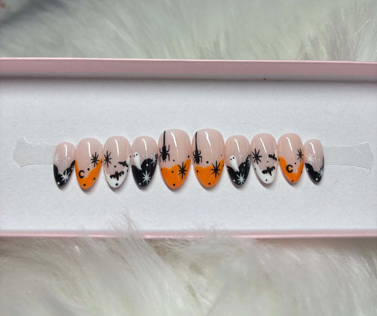 orange white black stars moons ghosts halloween spooky press-on nails by Polished by Maddie