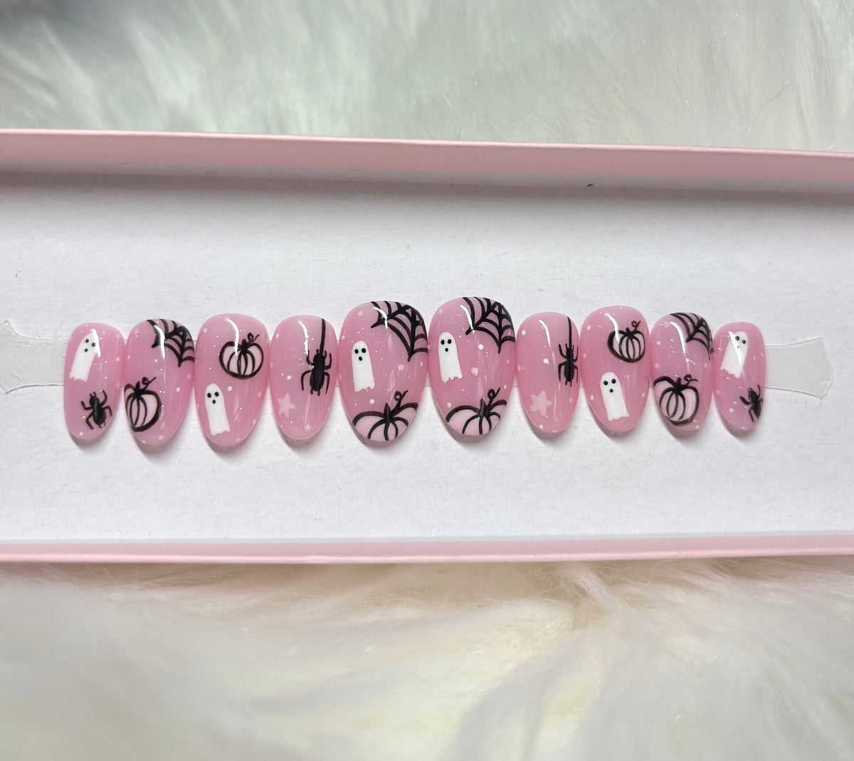 pink glitter halloween spooky pumpkins spiderwebs spiders girly press-on nails by Polished by Maddie