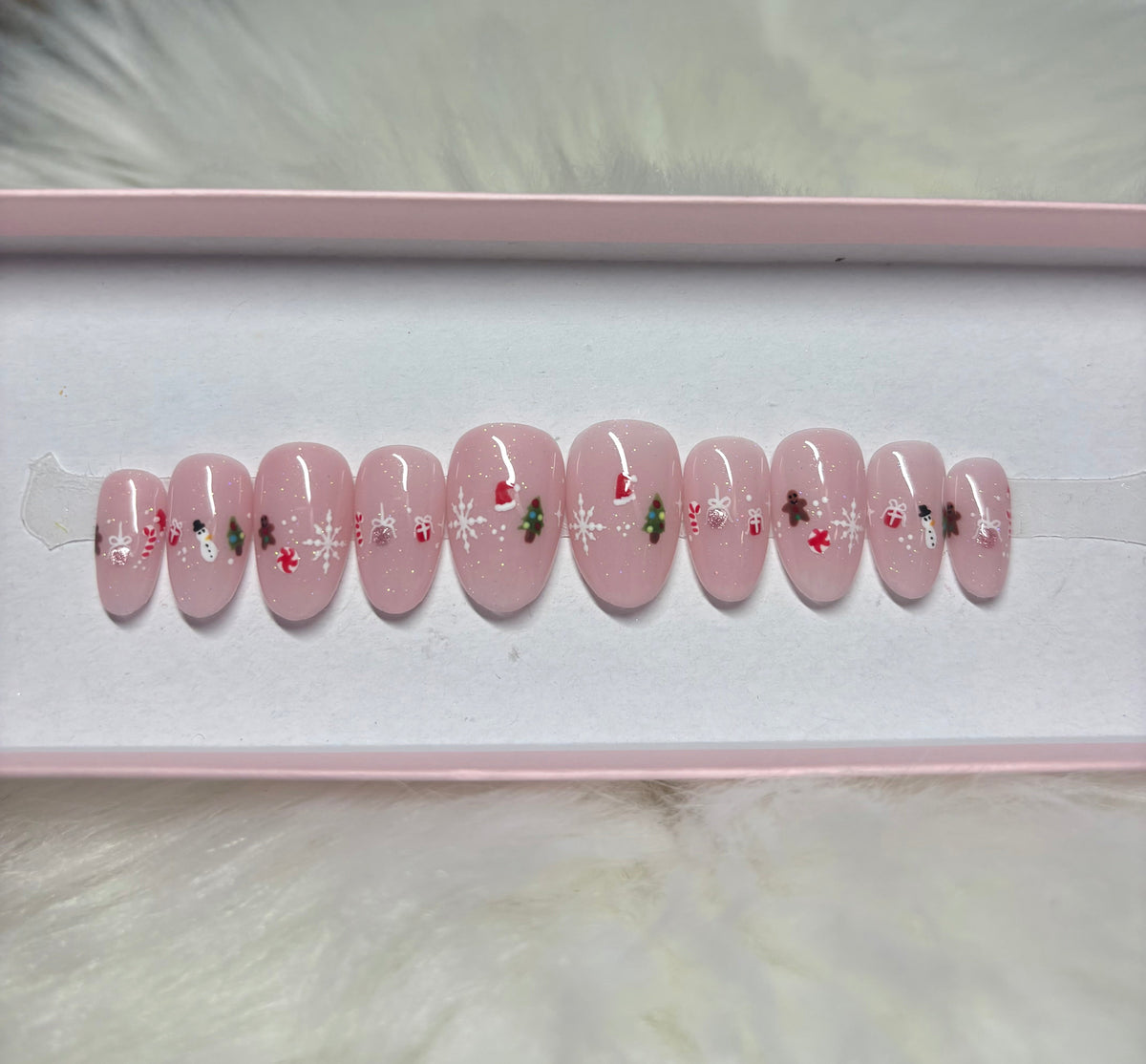 christmas holidays santa nude pink glitter candy cane snowflakes press-on nails by Polished by Maddie