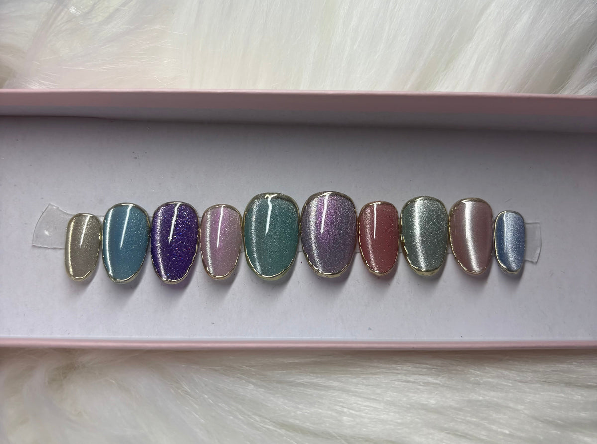 cat eye pastel rainbow gold chrome outline press-on nails by Polished by Maddie