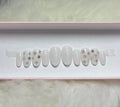 silver snowflakes christmas winter holidays milky white press-on nails by Polished by Maddie