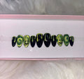 green neon cat eye velvet glitter halloween spooky nightmare before christmas press-on nails by Polished by Maddie