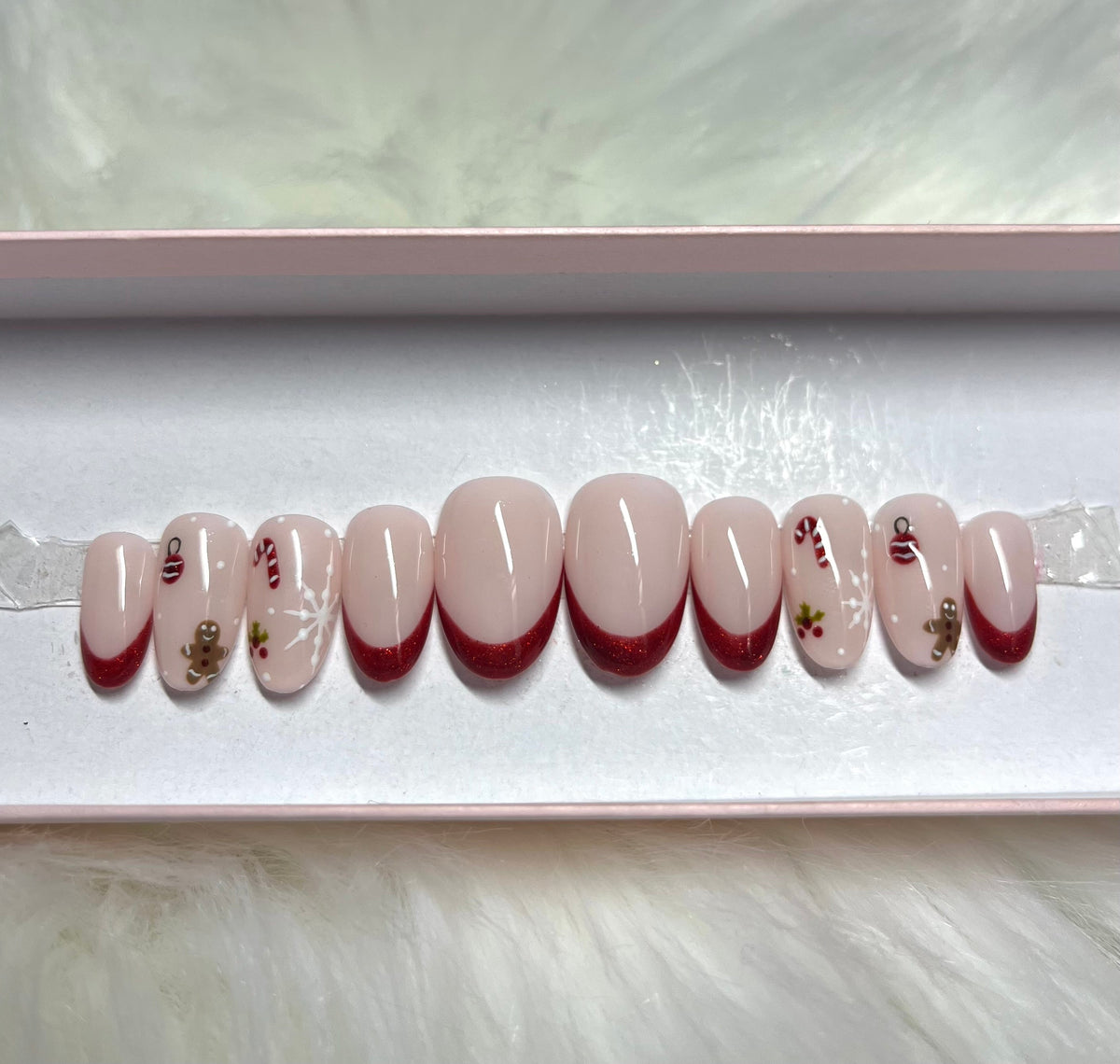 red glitter french tips christmas gingerbread candy cane ornament snowflake press-on nails by Polished by Maddie