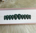 dark emerald green glitter with gold flakes press-on nails by Polished by Maddie