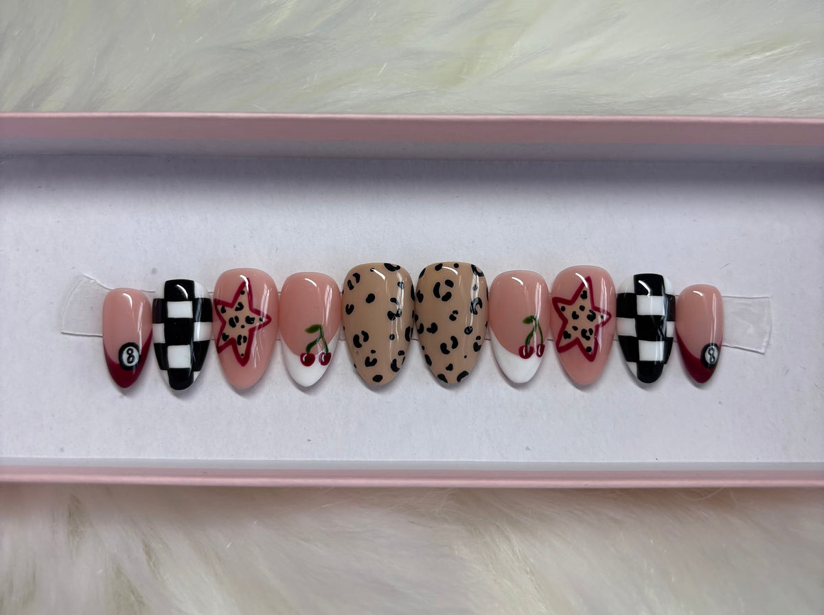 cheetah print star las vegas 8 ball checkers french tips press-on nails by Polished by Maddie