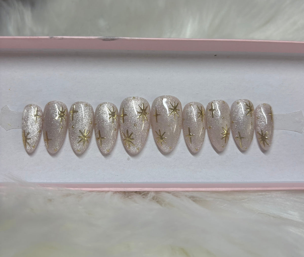 cat eye silver gold nye new years eve christmas holidays stars celestial press-on nails by Polished by Maddie