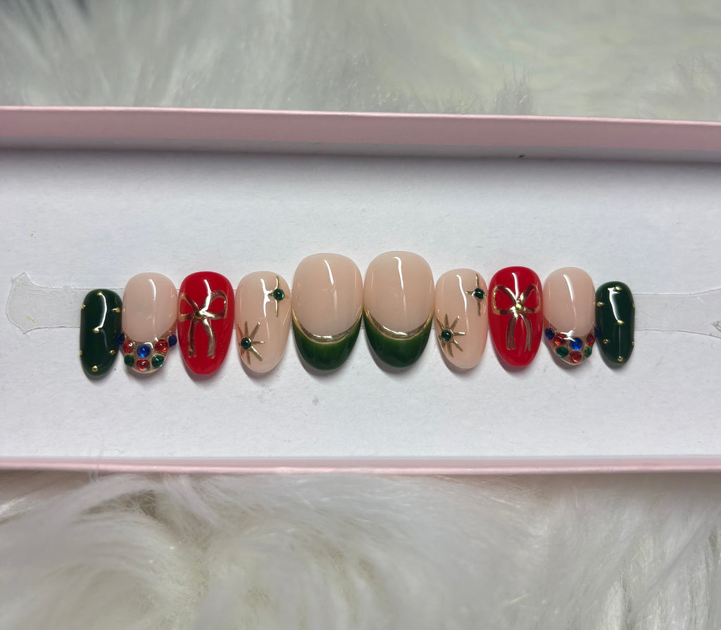red gold gems christmas holiday bow green stars press-on nails by Polished by Maddie