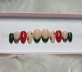 red gold gems christmas holiday bow green stars press-on nails by Polished by Maddie