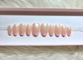 pink chrome hailey bieber glazed donut french tips whitney simmons press-on nails by Polished by Maddie